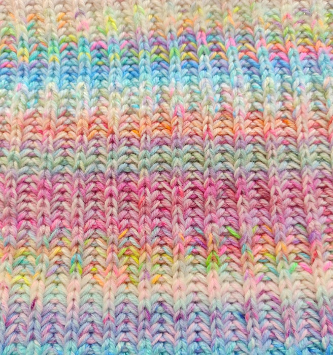 Rainbow colour brioche knit blanket closeup