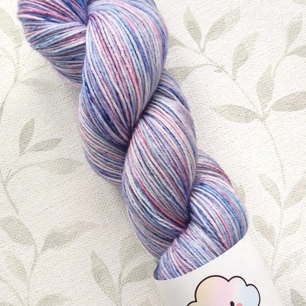 hand dyed 4 ply 100g in shades of lilac, pink and blue with pink, blue speckles. called Hyacinth Speckle.