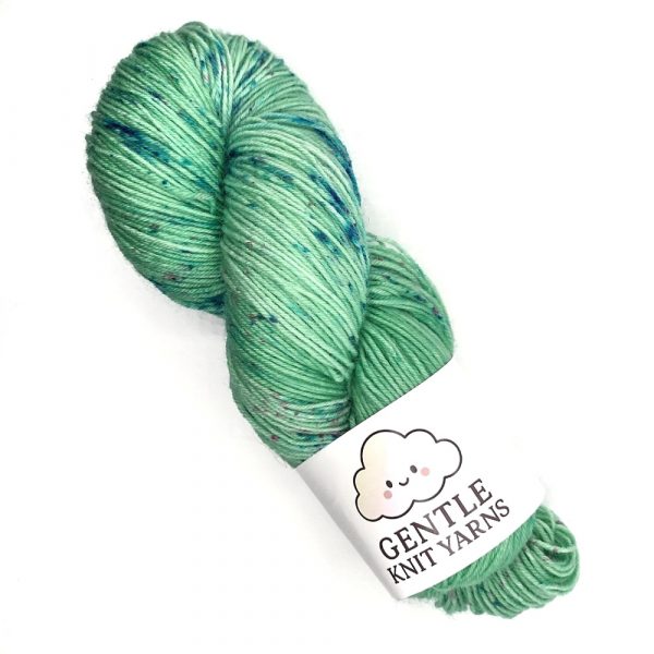 Soft green with blue pink speckles 4 ply 100g skein