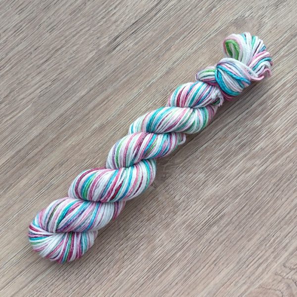 rainbow 25 mini skein with pink white and teal called Rosy Teal 4 ply