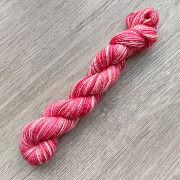 pink red tonal 25g skein blue faced leicester 4 ply called Strawberry Parfait