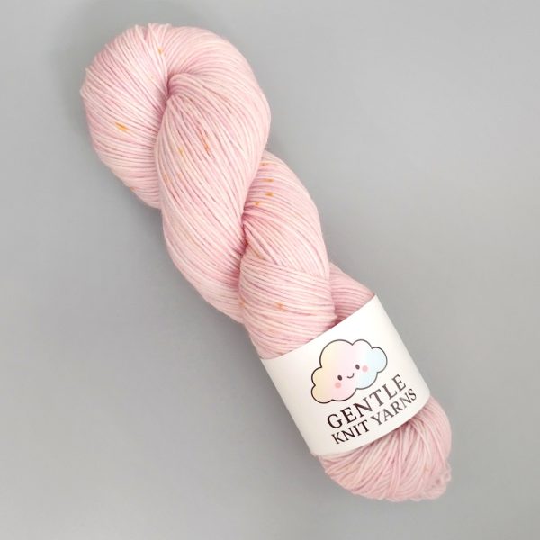 pink 100g 4 Ply yarn with lemon yellow speckles called pink saffron speckle