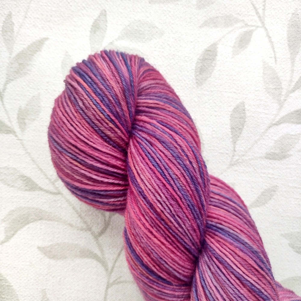 hand dyed 4 ply 100g in shades of plum, pink ,purple called Berry Harvest