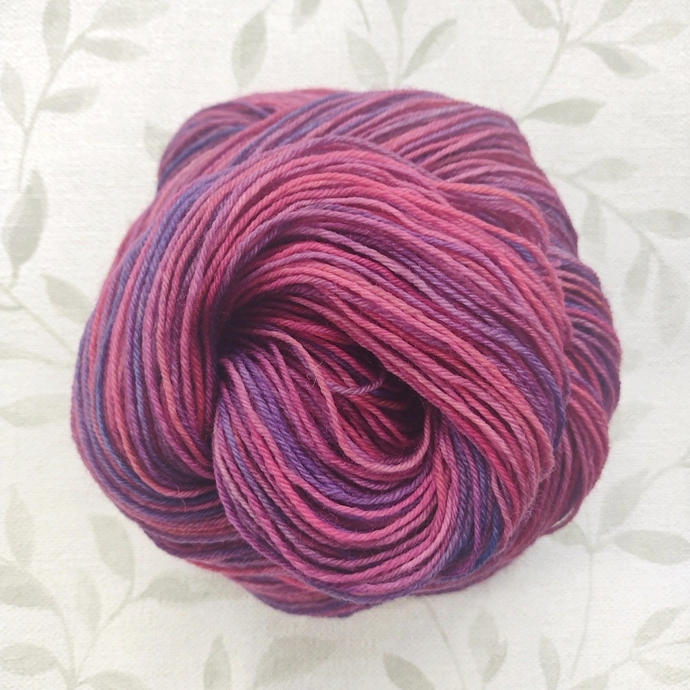 hand dyed 4 ply 100g in shades of plum, pink ,purple called Berry Harvest
