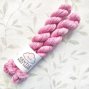 hand dyed 4 ply 2 x 20g mini skeins in shades of soft pink with pink and plum speckles called Pink Roses.