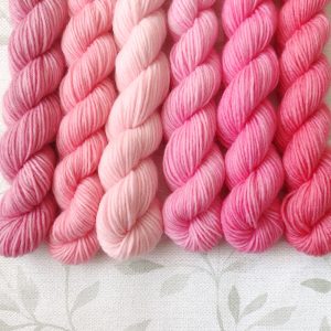 hand dyed 4ply x 20g mini skeins in shades of pink, set called Pink Roses mini set.