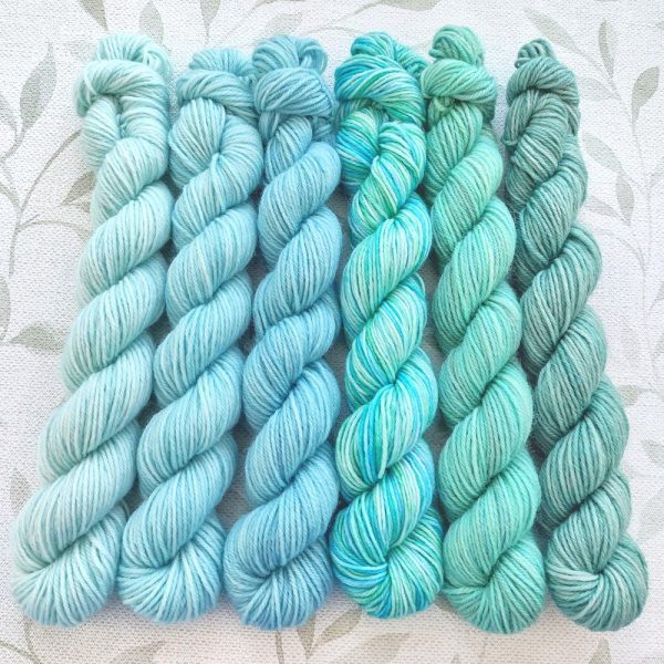 hand dyed 4 ply set of 6 x 20g mini skeins in shades of green called Seaglass Serenade mini set