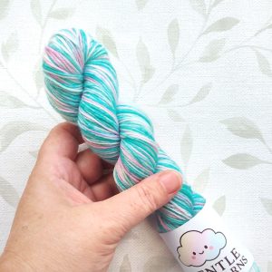 hand dyed 4 ply in shades of pink, aqua and white called Aqua Pink.