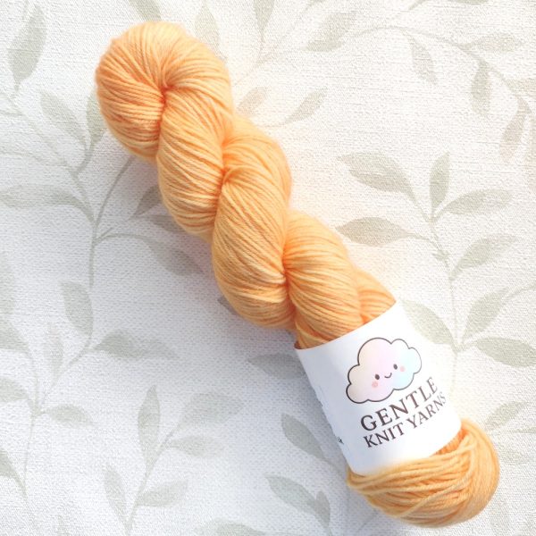 hand dyed 4 ply 50g in shades of soft peach called Just Peachy.
