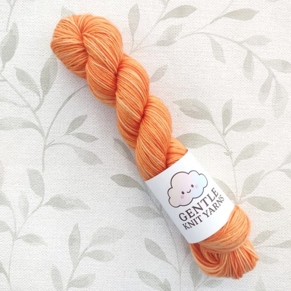 hand dyed 4 Ply 50g yarn in shades of orange, called Orange Marmalade.