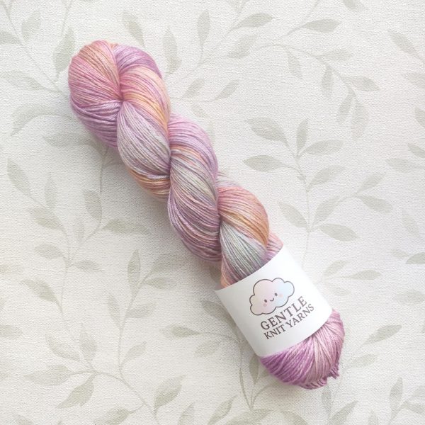 hand dyed 100g 4 ply silk merino blend yarn in pink and rainbow shades, called Pink Silky Rainbow.
